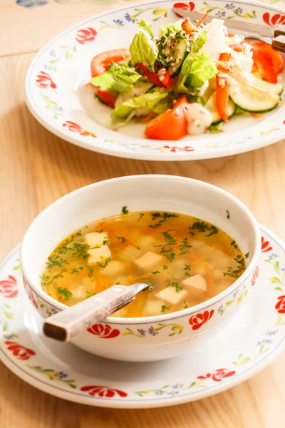 Dinner with soup and salad — Stock Photo, Image