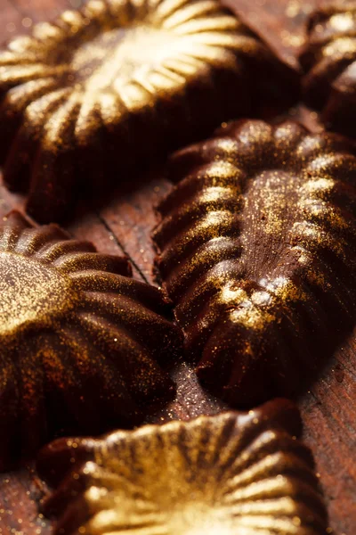 Dolci al cioccolato con polvere — Foto Stock