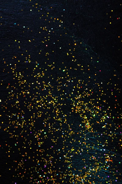 Glitter on black background — Stock Photo, Image