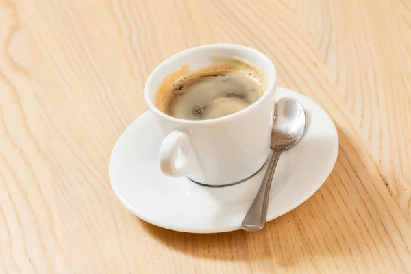 Kopp kaffe på tallerken – stockfoto