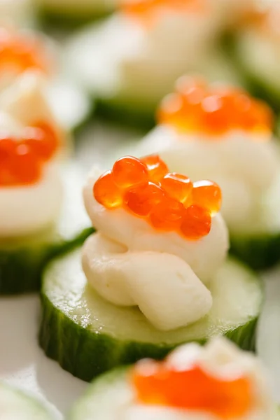 Tasty canapes with caviar — Stock Photo, Image