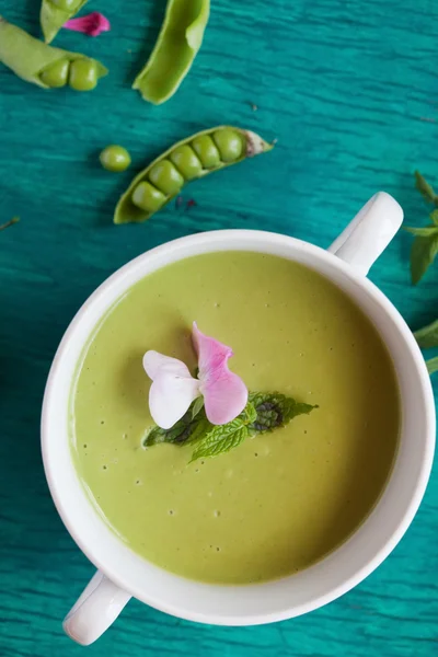 Green peas cream soup in plate — Stock Image Green peas cream soup in plate Stock Picture