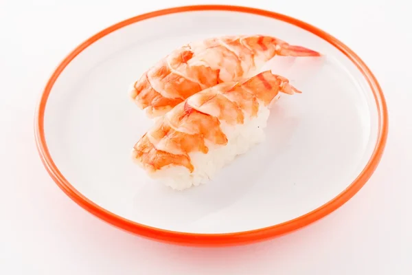 Nigiri med räkor på tallrik — Stockfoto