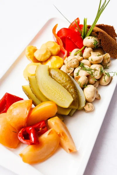 Plate of pickles on plate — Stock Photo, Image