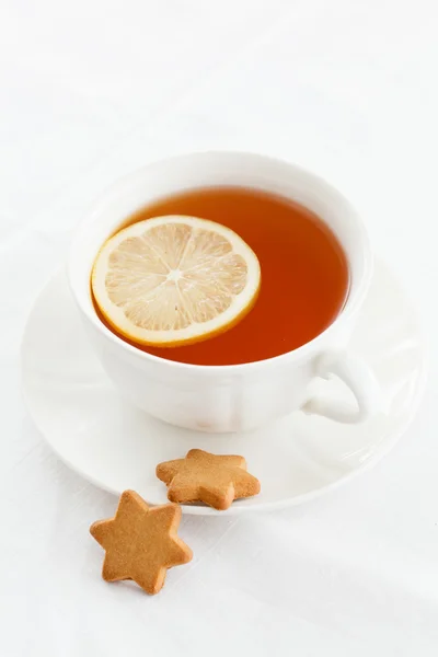 Tea with cookies on white — Stock Photo, Image