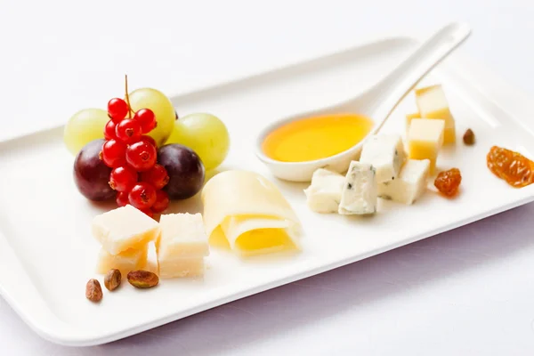 Cheese appetizer on plate — Stock Photo, Image