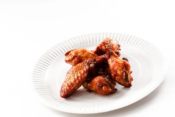 Fried chicken on paper plate — Stock Photo, Image