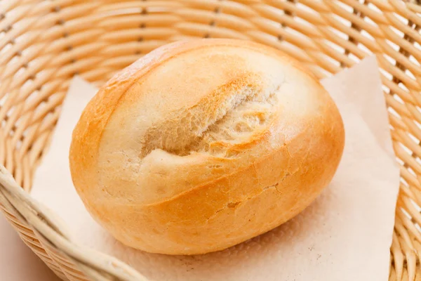 Fresh bun in basket — Stock Photo, Image