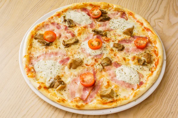 Tasty pizza with ham — Stock Photo, Image