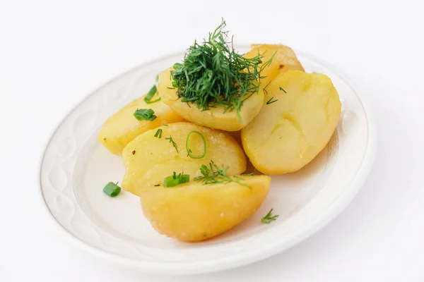 Roasted potatoes on plate — Stock Photo, Image
