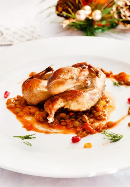 Quail with lentil on plate — Stock Photo, Image