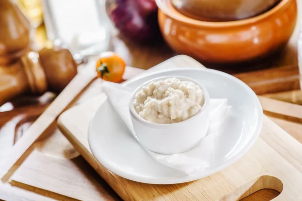 Tasty horseradish on plate — Stock Photo, Image