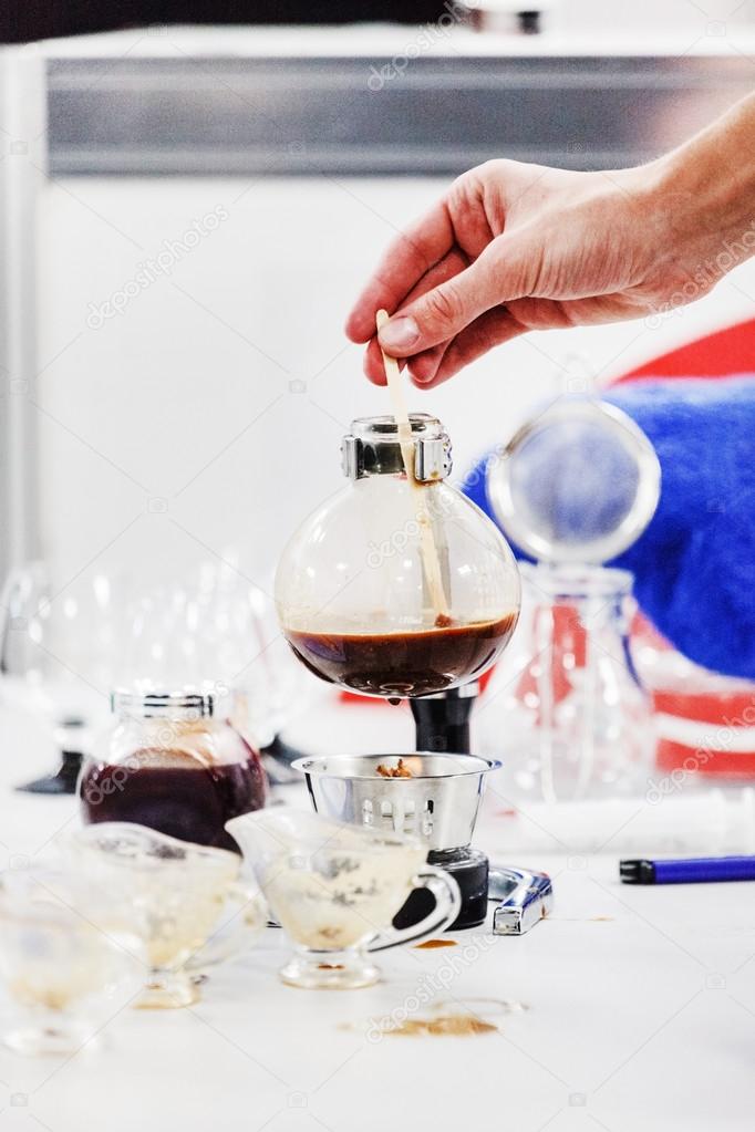barista making coffee