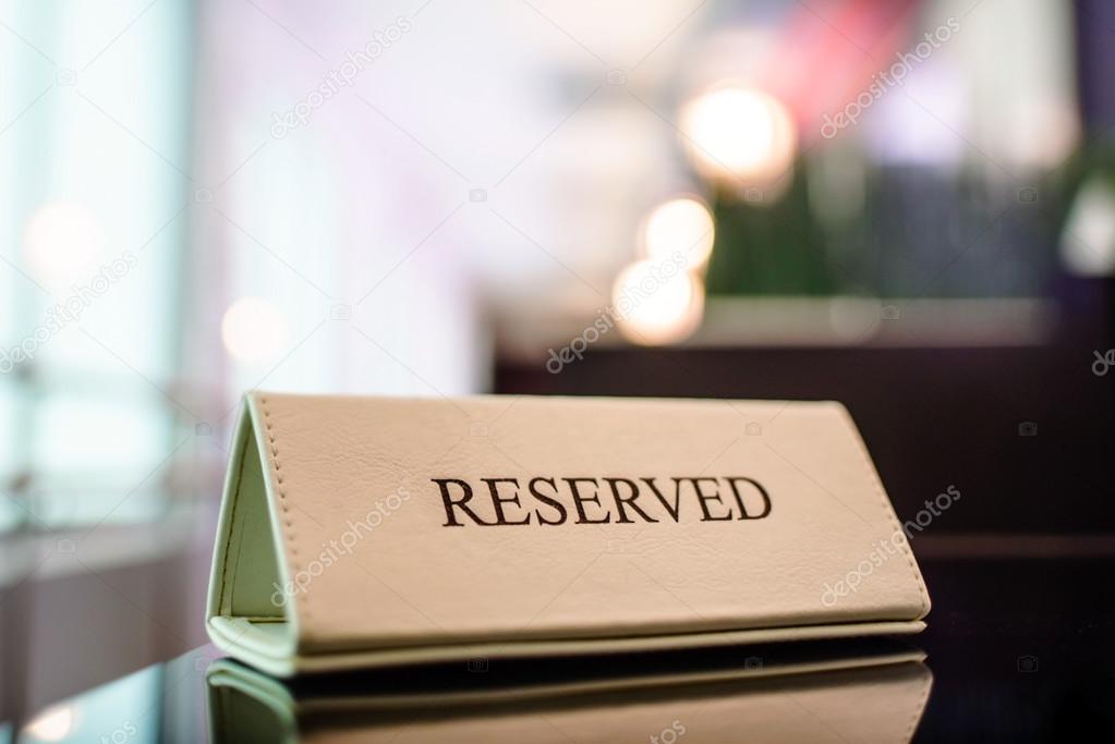 Restaurant reserved table sign