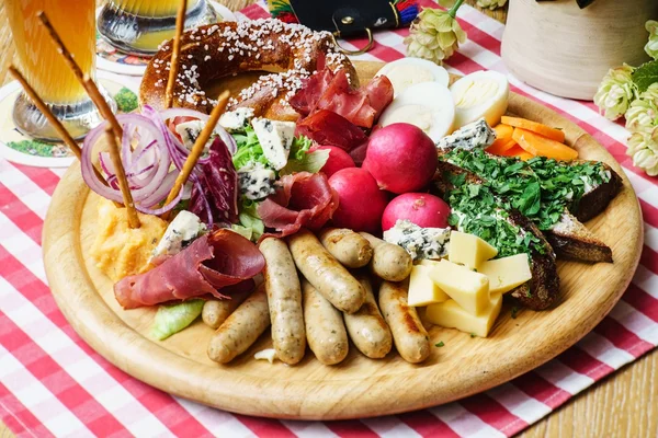 Oktoberfest appetizer with meat and vegetables — Stock Photo, Image