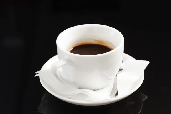 Cup of coffee on black — Stock Photo, Image