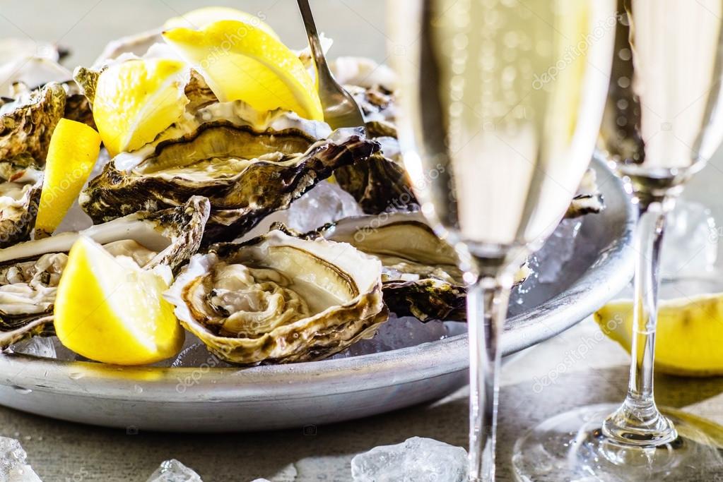 Opened Oysters with lemon