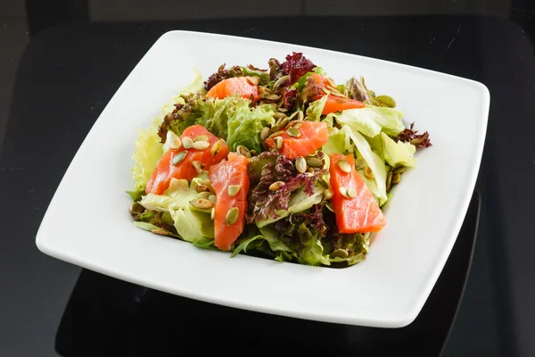 salmon salad on plate