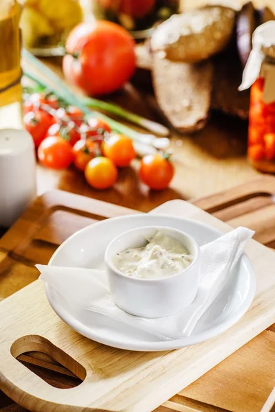 Cheese sauce on plate — Stock Photo, Image