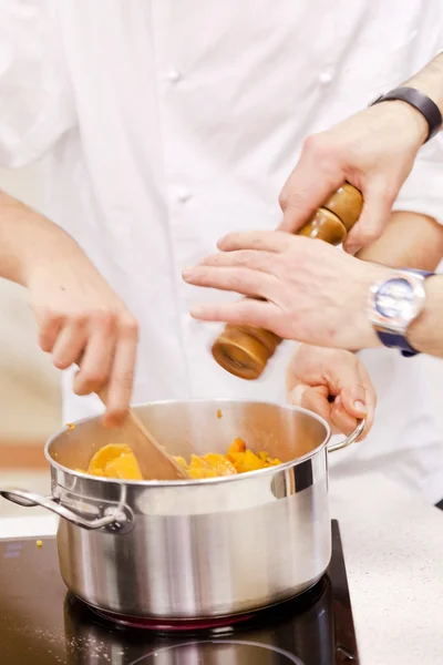 Professional chefs at work — Stock Photo, Image