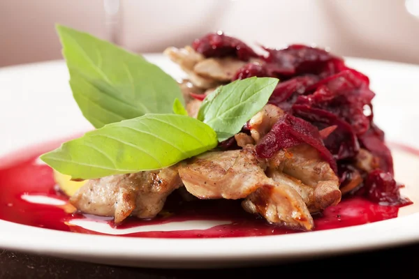 Meat with mango and sauce — Stock Photo, Image