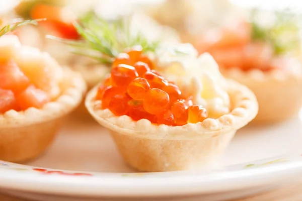 Red caviar canapes — Stock Photo, Image