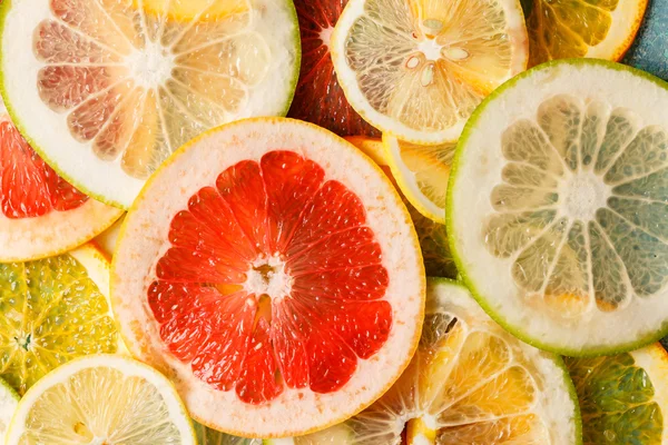 Citrus slices background — Stock Photo, Image