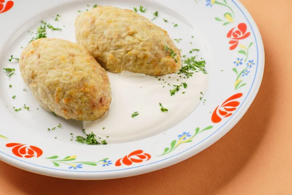 Tasty cutlets on plate — Stock Photo, Image