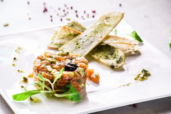 Salmon tartare on plate — Stock Photo, Image