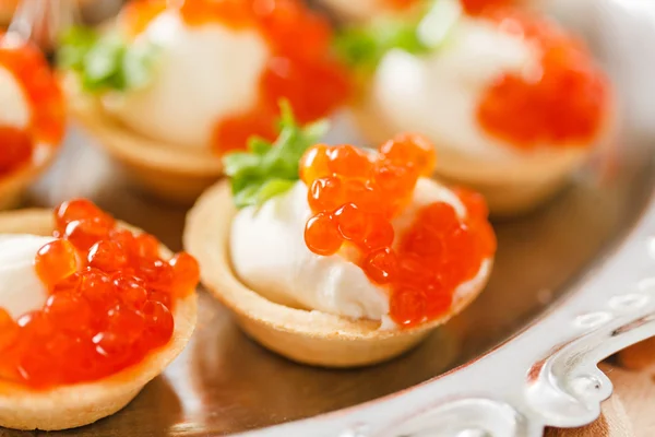 Delicious canapes with caviar — Stock Photo, Image