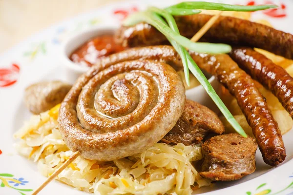 German sausages with sauerkraut — Stock Photo, Image