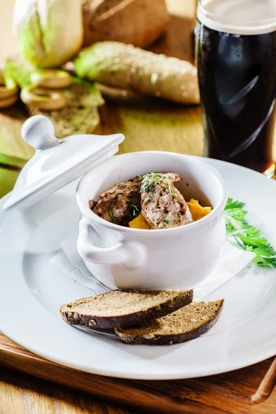 Delicious goulash casserole in pot — Stock Photo, Image