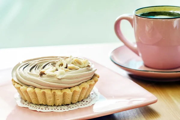 Koffie met romige gebak — Stockfoto