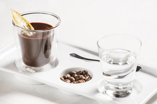 Hot chocolate on plate — Stock Photo, Image