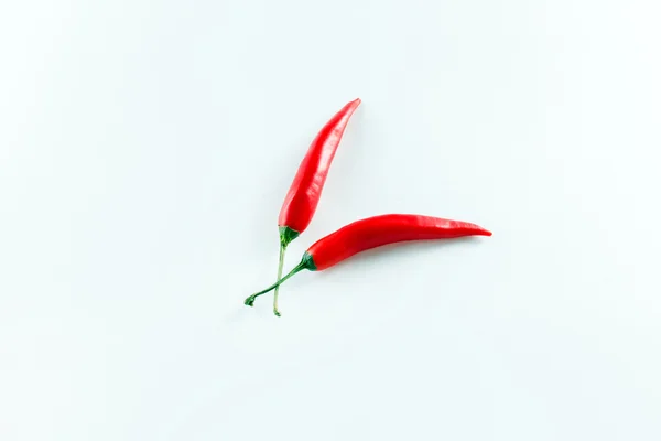 Hot peppers on white — Stock Photo, Image