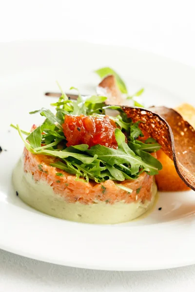 Salmon tartare on plate — Stock Photo, Image