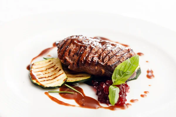 Tasty grilled steak with vegetables — Stock Photo, Image