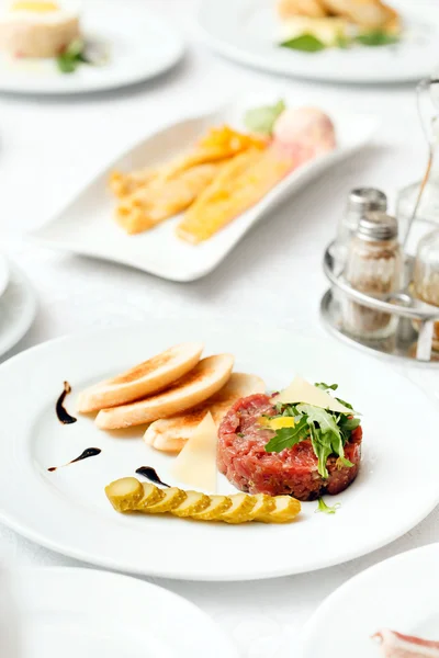 Table with delicious food — Stock Photo, Image