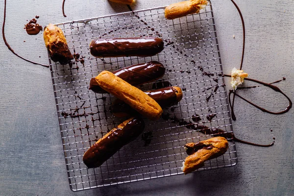 Sweet chocolate eclairs — Stock Photo, Image