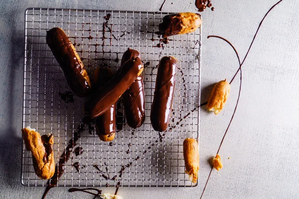 Sweet chocolate eclairs — Stock Photo, Image