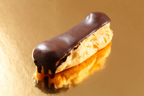 Eclair francese con cioccolato — Foto Stock