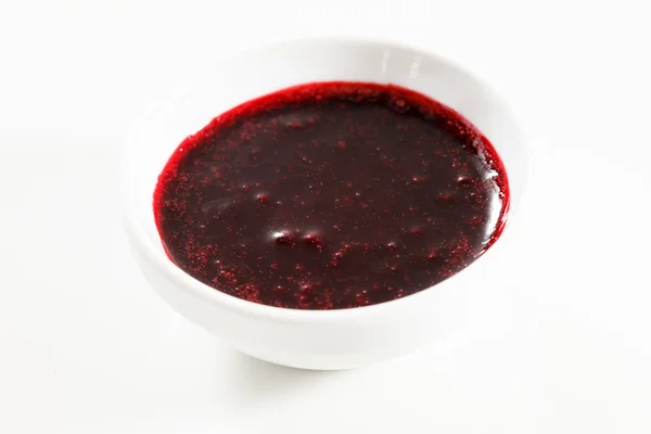 Jam in bowl on white — Stock Photo, Image