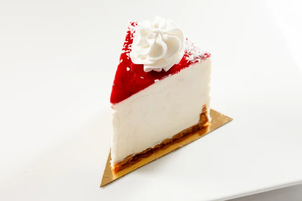 Tasty cheesecake on plate — Stock Photo, Image