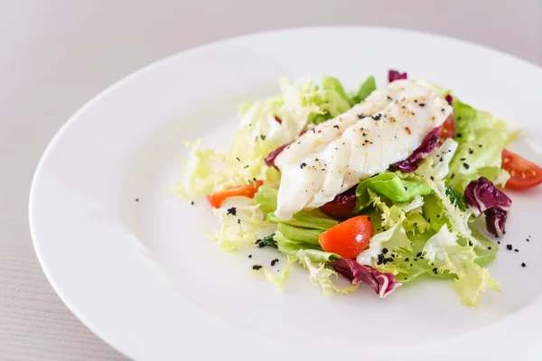 Tasty salad on plate — Stock Photo, Image