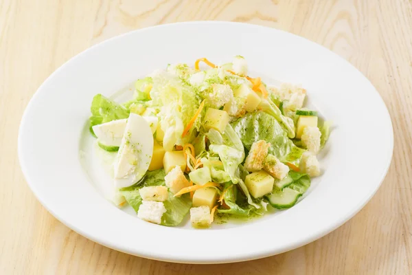 Caesar salad on plate — Stock Photo, Image