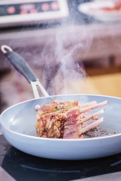 Cooking ribs in the pan — Stock Image Cooking ribs in the pan Stock Image