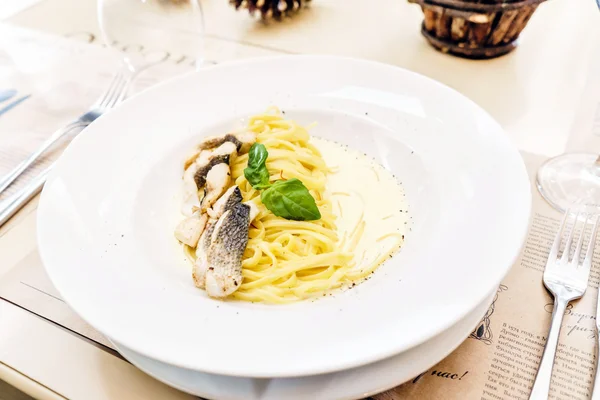Tasty pasta with fish — Stock Photo, Image