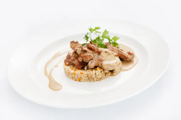 Delicious rabbit meat with barley — Stock Photo, Image