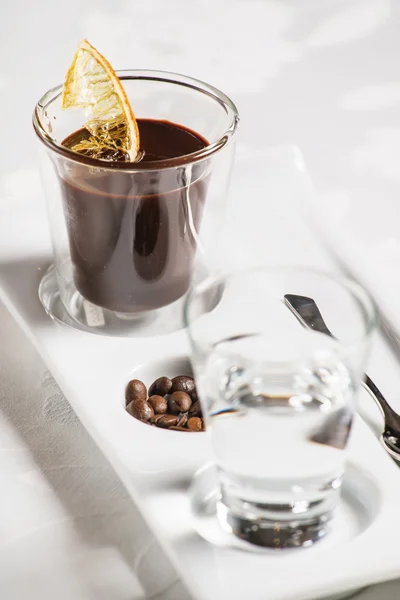 Hot chocolate on plate — Stock Photo, Image