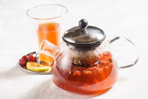 Teapot with tea and cup — Stock Photo, Image